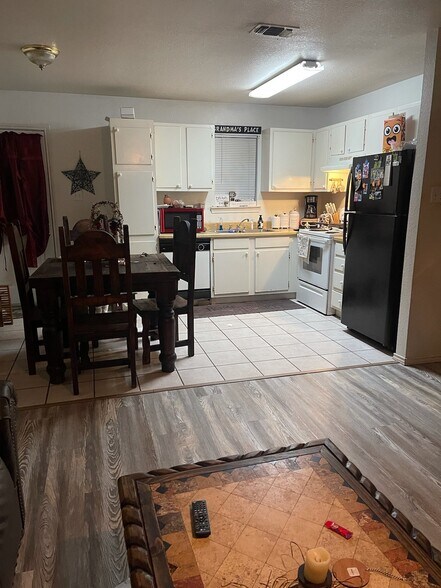 UNIT E, old photo with furnishings - 605 College St