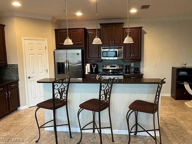 Building Photo - 8570 Evernia Ct