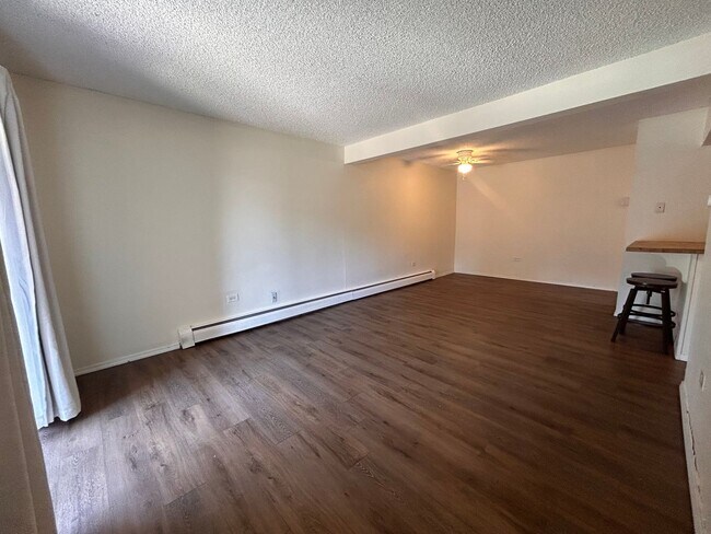 Building Photo - $0 DEPOSIT OPTION, CHARMING 1-BEDROOM CONDO IN FORT LOGAN WITH MODERN UPGRADES