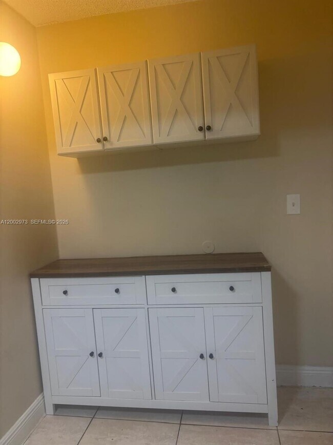 Building Photo - 6950 W 6th Ave