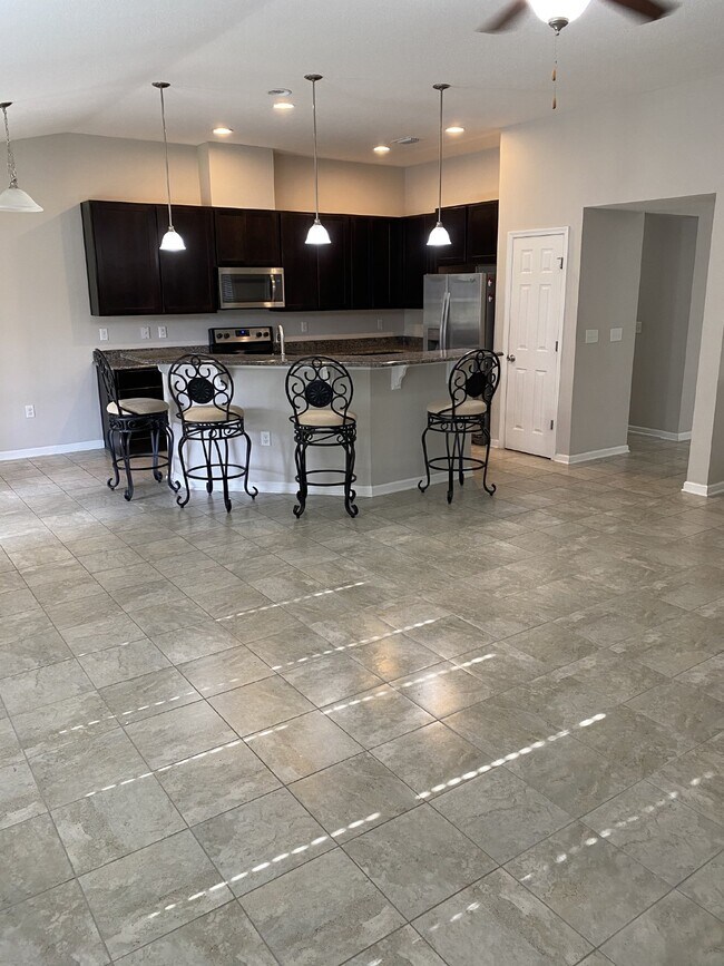 Building Photo - Elegant 4BR Home with Gourmet Kitchen, Smart Tech Package & Nature Views - Coming Soon