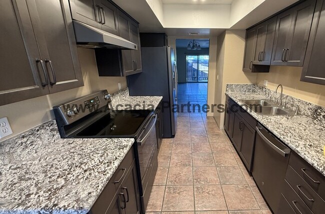 Building Photo - Three bedroom townhome with community pool