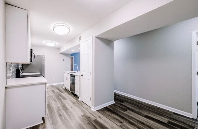 Building Photo - Spacious 2-Bedroom Elite Apartment with Private Balconies & Washer/Dryer