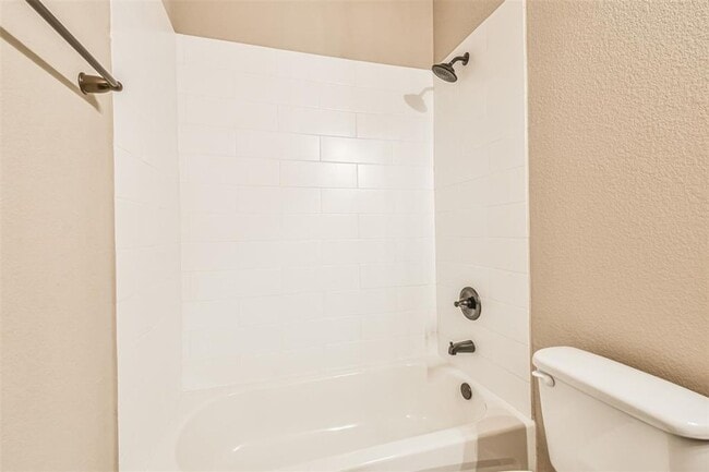 Building Photo - Modern 3-Bedroom Duplex with Granite Counters, Private Yard, and Prime Location