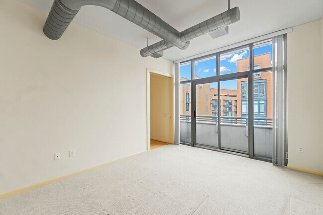 Building Photo - Madrigal Lofts in Mt Vernon Triangle | 2 Bed | 2 Bath | 920 Sf | Balcony | 1 Garage Parking Space