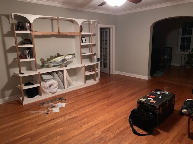 Custom built-in, which fits 60-inch screen (don't worry, Large mouth bass not included). - 1337 E Morehead St