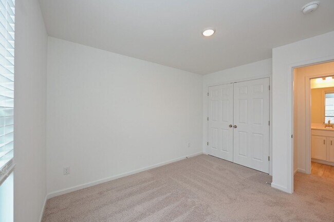 Building Photo - **BE THE LUCKY ONE TO LIVE IN THIS 2024-BUILT BRICK TOWNHOME IN THE VILLAS AT REGAL SQUARE FEATUR...