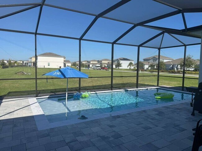 Building Photo - Modern 3-Bedroom Home with Pool and Lake View