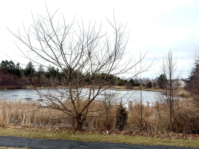 Building Photo - Partially Furnished - Bright & Spacious 2BR/1.5 BA CONDO - End-Unit w/ 2-Car Garage, Appliances, ...