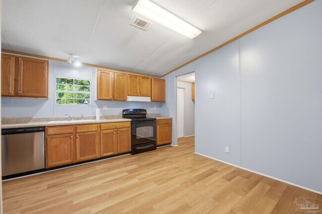 Building Photo - 1709 Woodchuck Ave