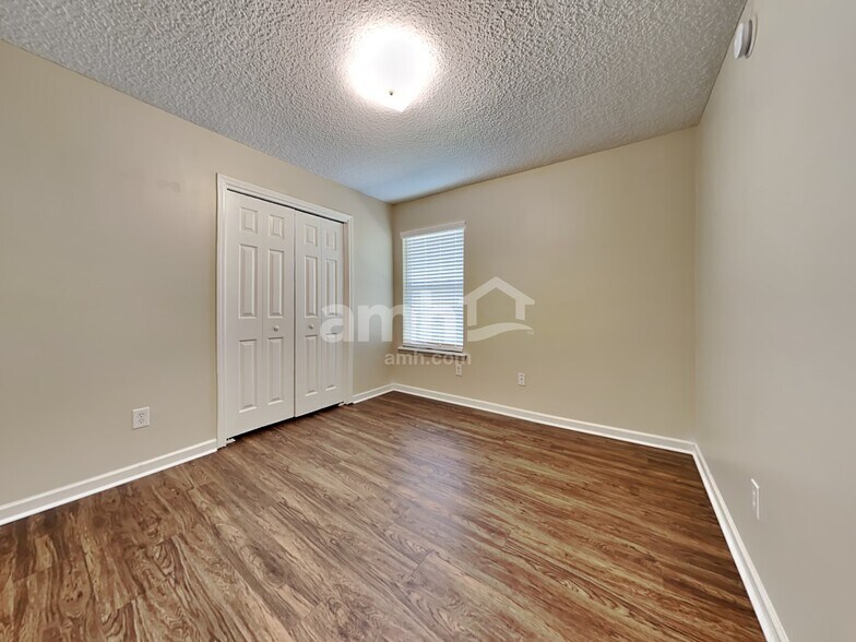 Building Photo - 7152 Rapid River Dr N