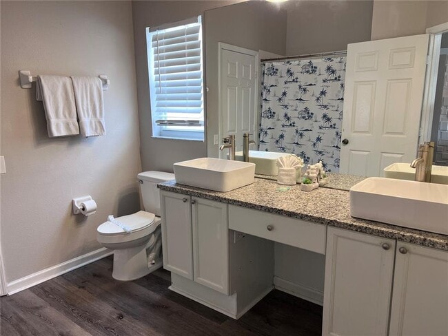 Building Photo - 8121 Fan Palm Way