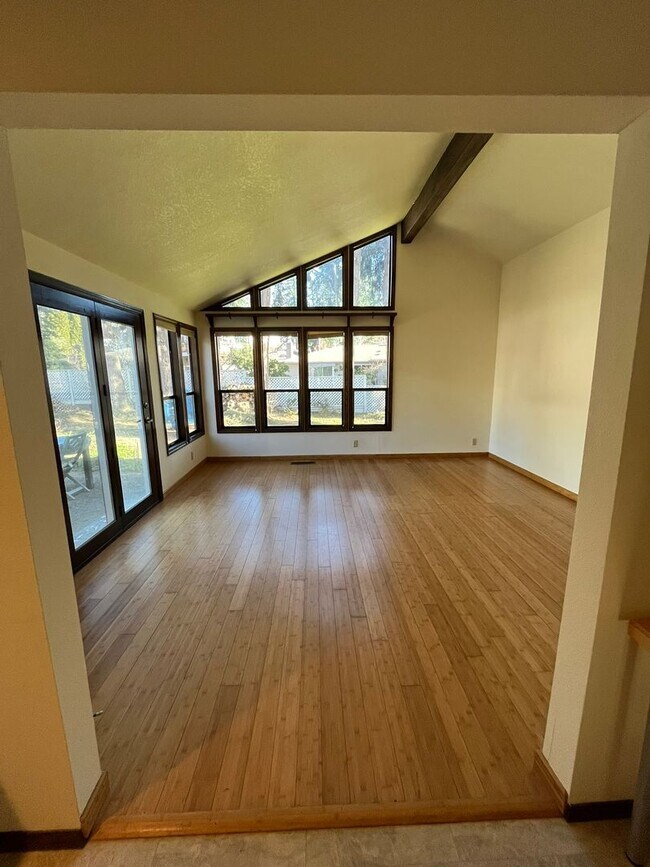 Building Photo - Beautiful One-Level Home with Sunroom, Vaulted Ceilings & Multiple Living Areas