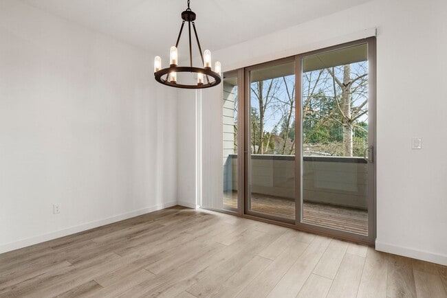 Building Photo - Modern 3 Bed 3.5 Bath Townhome with Garage, Balcony and Fenced Yard Near Light Rail