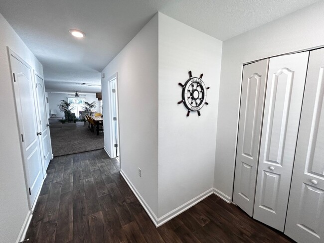 Building Photo - Picturesque Waterfront 4-Bedroom Home with...