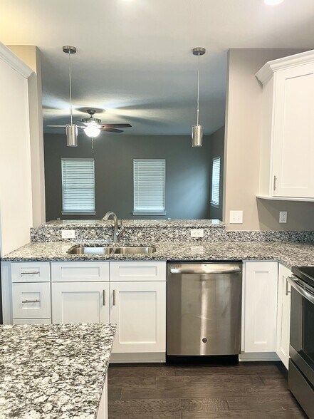 Kitchen view to living room - 6157 Winthrop Ave