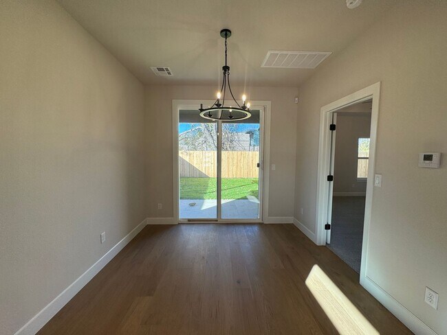 Building Photo - BRAND NEW - 4 bed - 3 bath - 2 car with fenced yard!