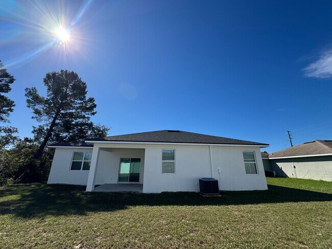 Building Photo - $500 OFF OF A MONTH OF RENT! Beautiful 4BD/2BA Home in Poinciana – No HOA Approval Needed! Pets W...