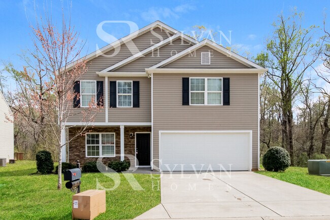 Building Photo - A must see 4-bedroom, 2.5 bath home in Oak Pointe.