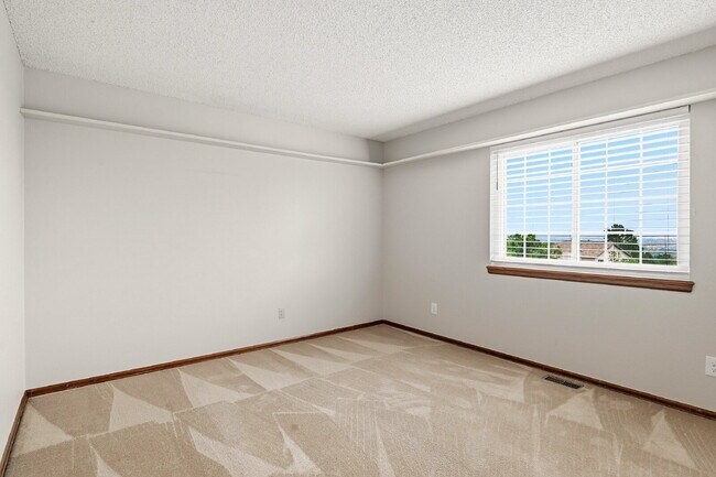 Building Photo - $2,845.95- 4-Bed /3-Bath Gem with Finished Basement and Fenced-in Yard in Colorado Springs!