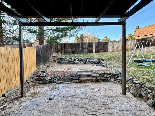 Building Photo - Updated 3BR Evergreen Home w/ Garage & Fenced Yard