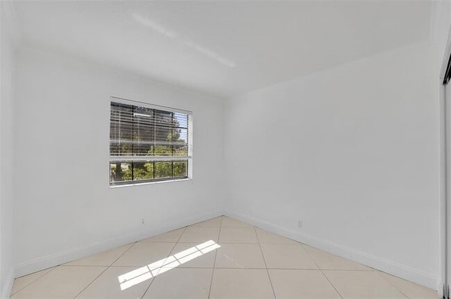 Building Photo - 12244 Royal Palm Blvd