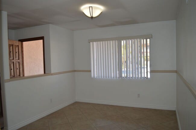 Building Photo - Four Bedroom, Two Bathroom Single Story Home With Two Car Garage