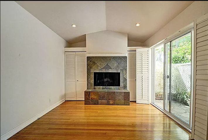 living room or bedroom with 2 large closets - 8938 Hubbard St