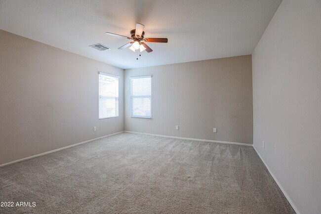 Building Photo - 12108 W Range Mule Dr