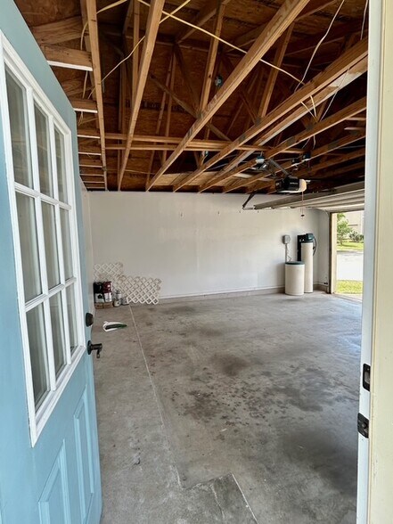 Two car garage with overhead storage - 1702 Sand Hills Dr