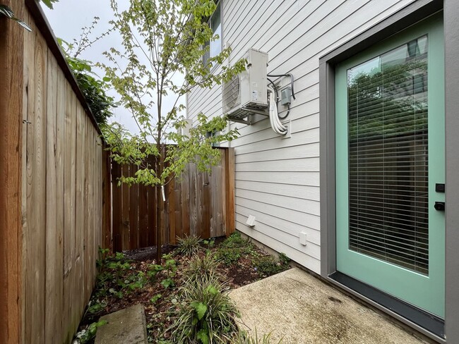 Building Photo - Modern 2-Bed, 1.5-Bath Condo with Custom Kitchen, Private Patio, and Prime Location