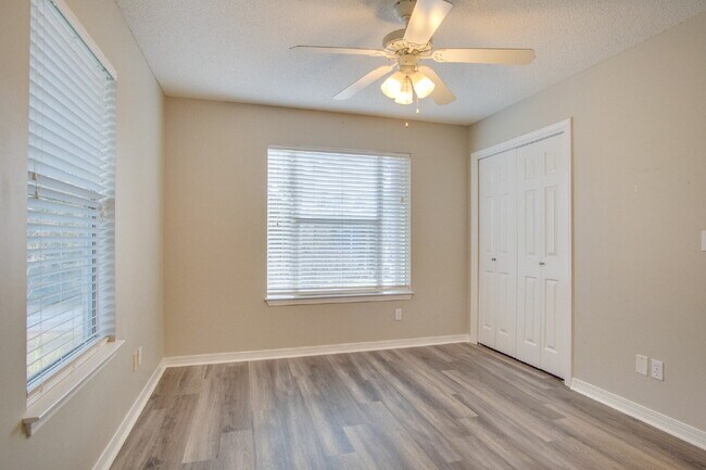 Building Photo - Live the Gulf Breeze Waterfront Life – Dock, Canal Access & Boat Lift!