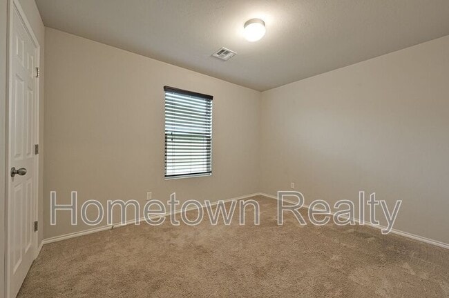 Building Photo - 9708 High Noon Rd