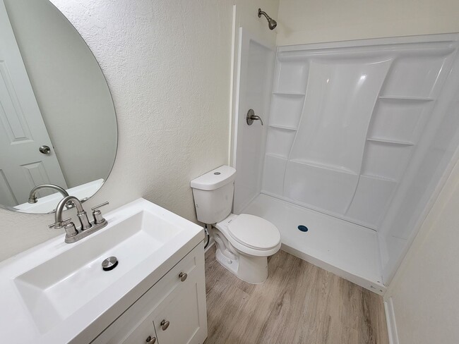 Building Photo - REMODELED 4 BEDROOM 2 BATH LEASE HOME IN A...