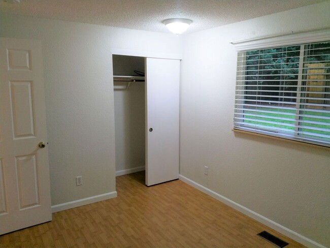 Building Photo - Charming updated 3 bed 1 bath ranch style home with double car garage and large fenced back yard.