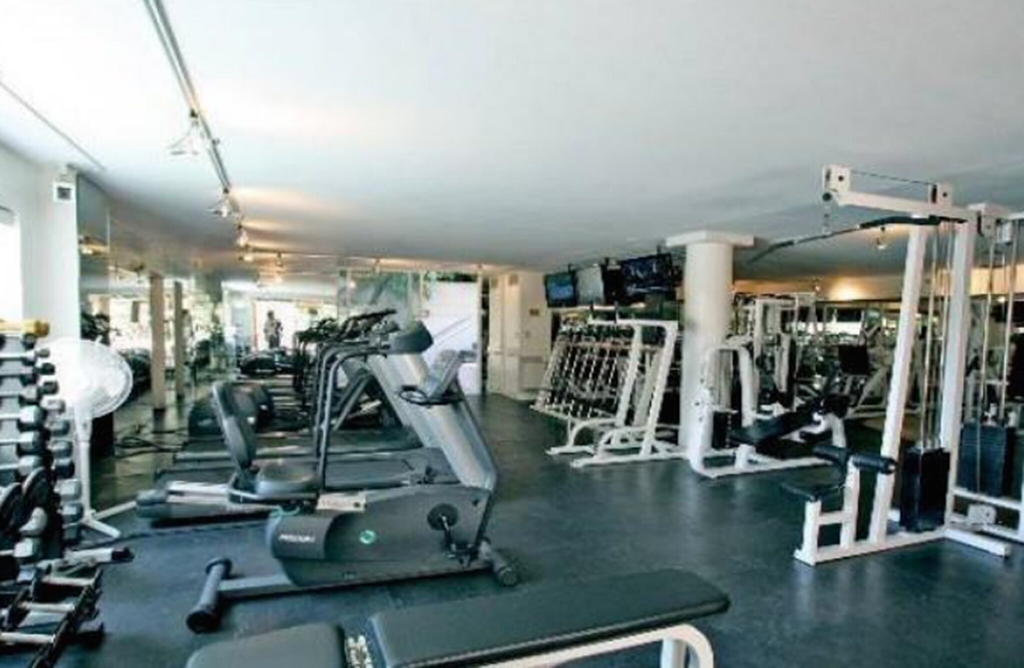 The fully furnished gym has everything you need, including bathrooms and a water faucet - 1131 Alta Loma Rd