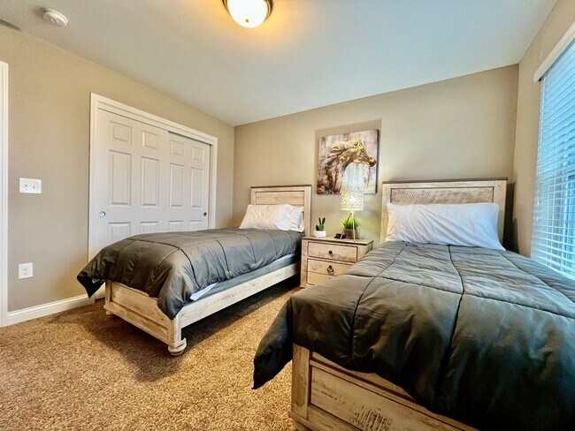 Building Photo - Executive corporate rental features community pool. Fully furnished and includes all utilities.