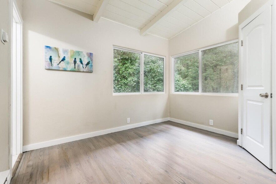 Smaller bedroom (11x9) has only a small triangular closet. See floor plan below for more details. - 665 Cathedral Dr