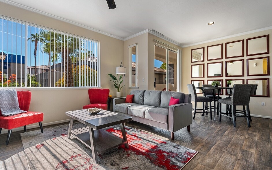 Living and dining share one long room with the window at the near end. - Mountainside