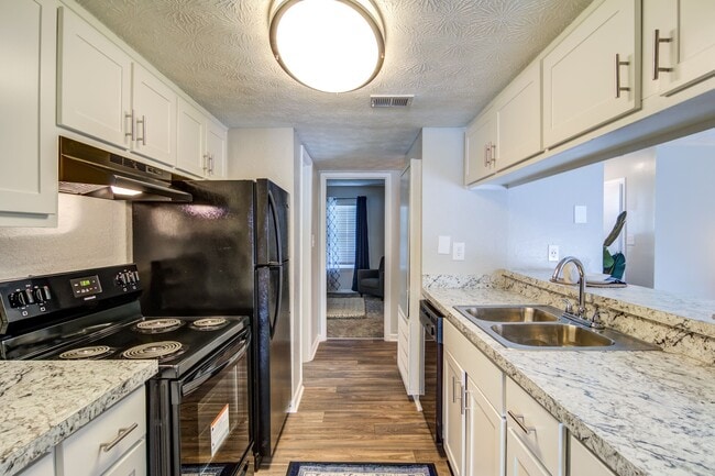 Building Photo - Flats and Townhomes