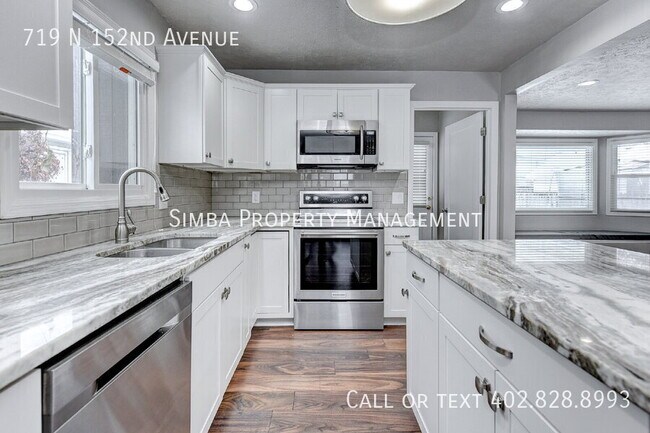 Building Photo - 719 N 152nd Ave