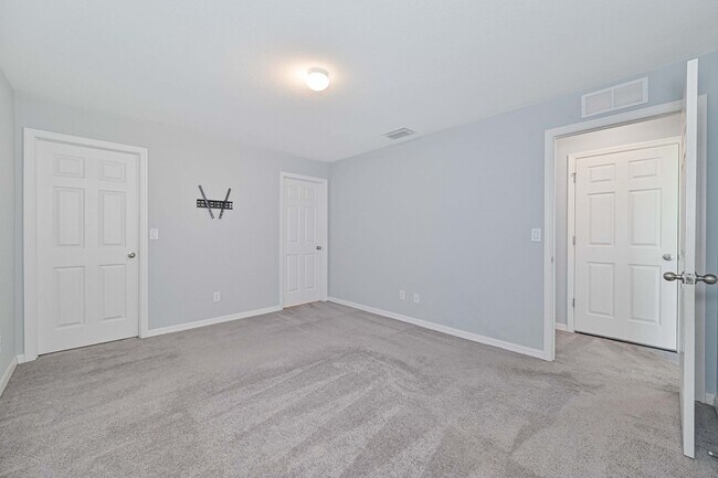 Building Photo - Spacious Three-Bedroom Home with Open Floor Plan, Large Yard