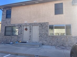 Building Photo - Two bedroom, one and bathroom townhome loc...