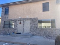 Building Photo - Two bedroom, one and bathroom townhome loc...