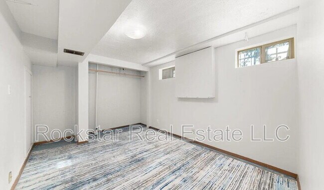 Building Photo - 1110 E 28th Ave