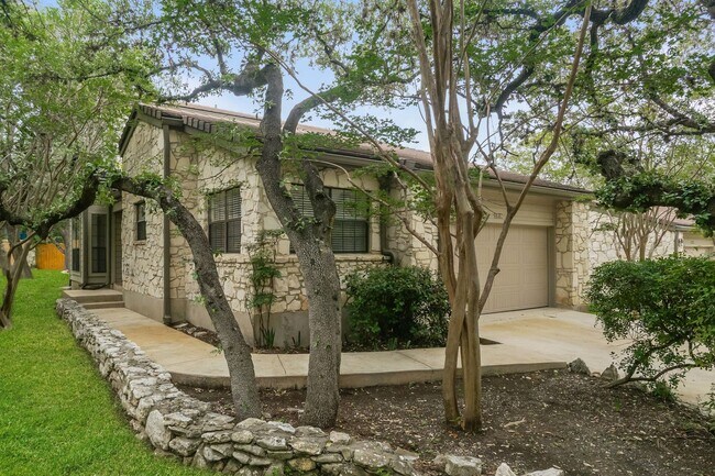 Building Photo - Charming 2-Bedroom Condo in Gated Community Surrounded by Mature Trees
