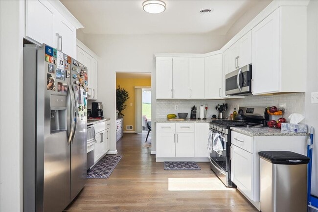 Building Photo - COMING SOON - Fresh and Updated - 4Bed/3Bath Split Level  w/ spacious yard