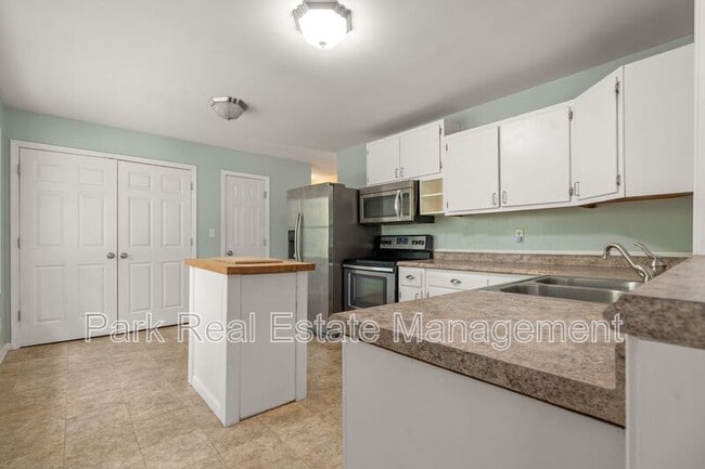 Building Photo - 8907 Rollingwood Rd