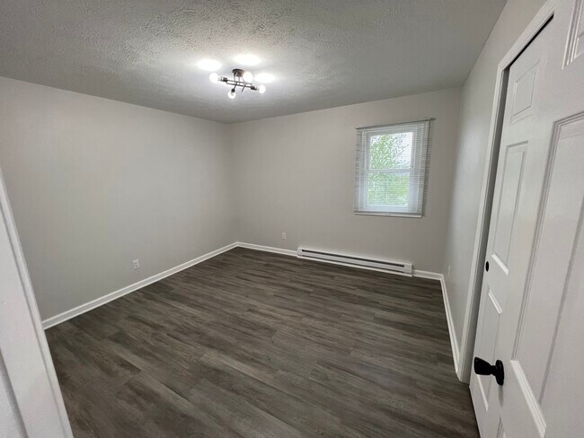 Building Photo - 5684 Windy Knoll Dr