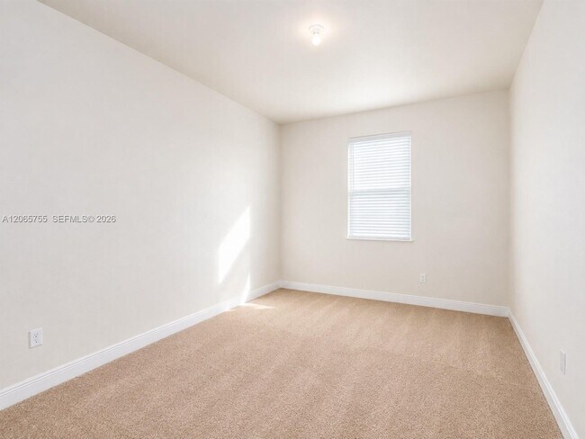 Building Photo - 10976 SW Tessili Wy